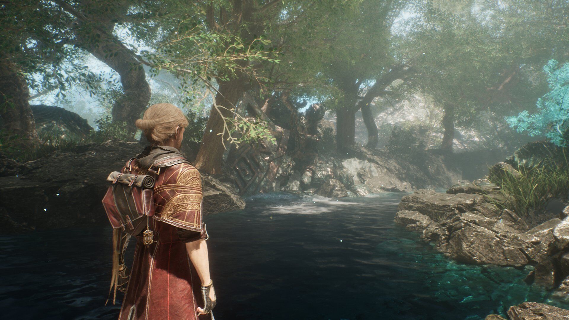 Gustave, the main character of Expedition 33, stands in a forest area with a path in front of him